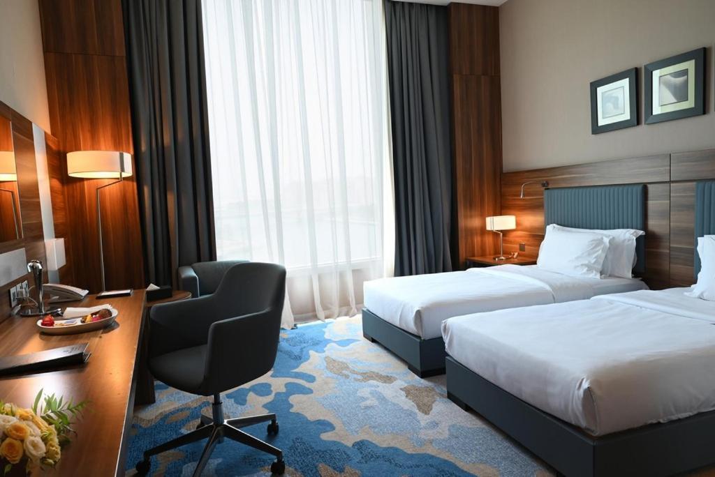 Bay La Sun Hotel And Marina - Emaar King Abdullah Economic City Екстер'єр фото A room at the hotel