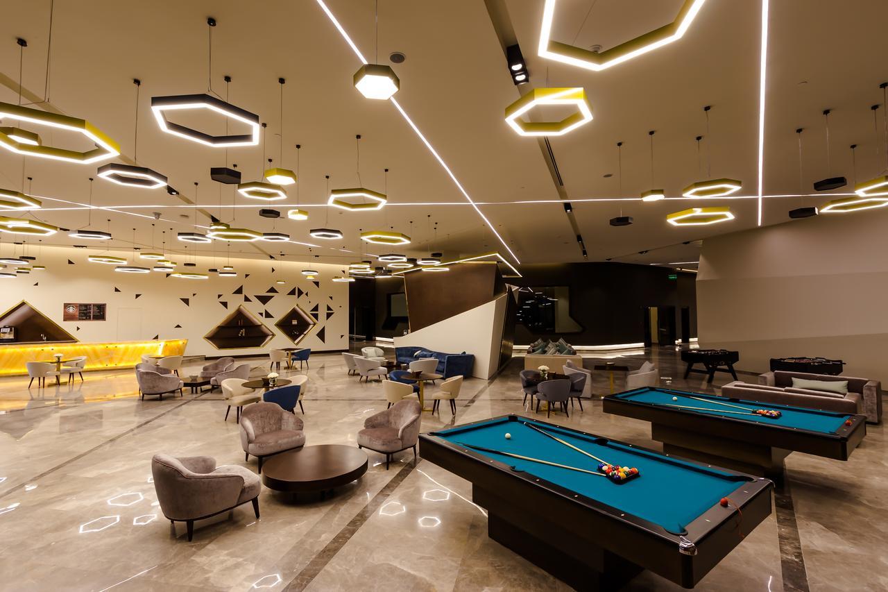 Bay La Sun Hotel And Marina - Emaar King Abdullah Economic City Екстер'єр фото The lounge at the airport